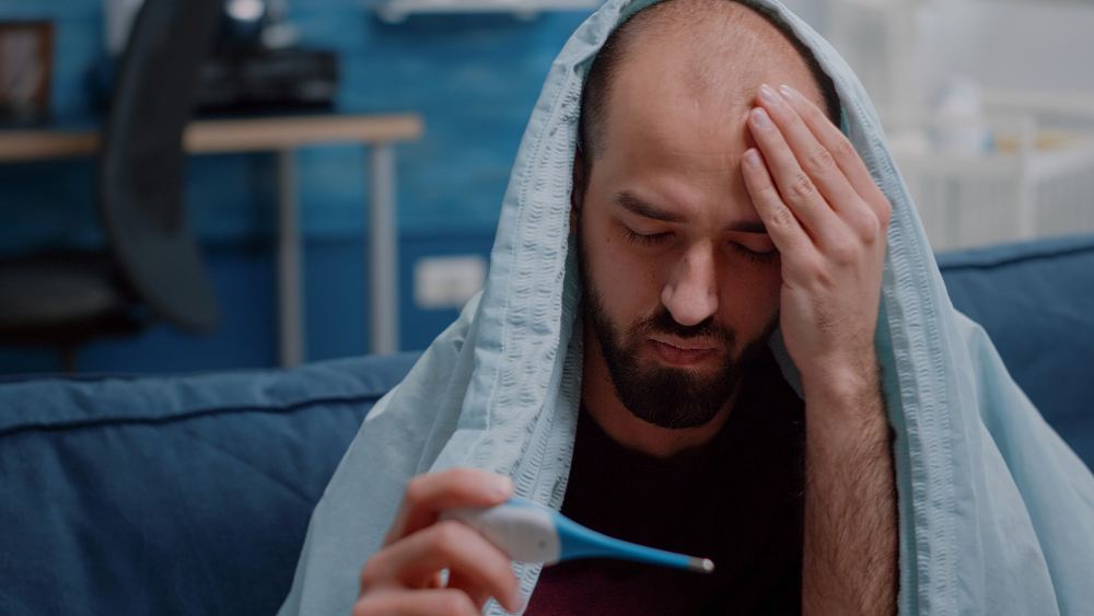 Fever in Adults: When to Go to a Walk-In Clinic vs Stay Home